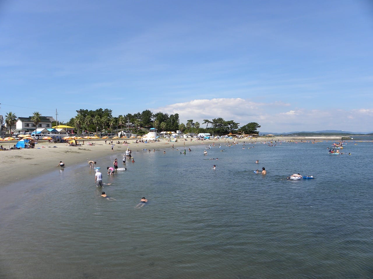 Kids swim at Eqast Beach on Himakojim Island, Japan