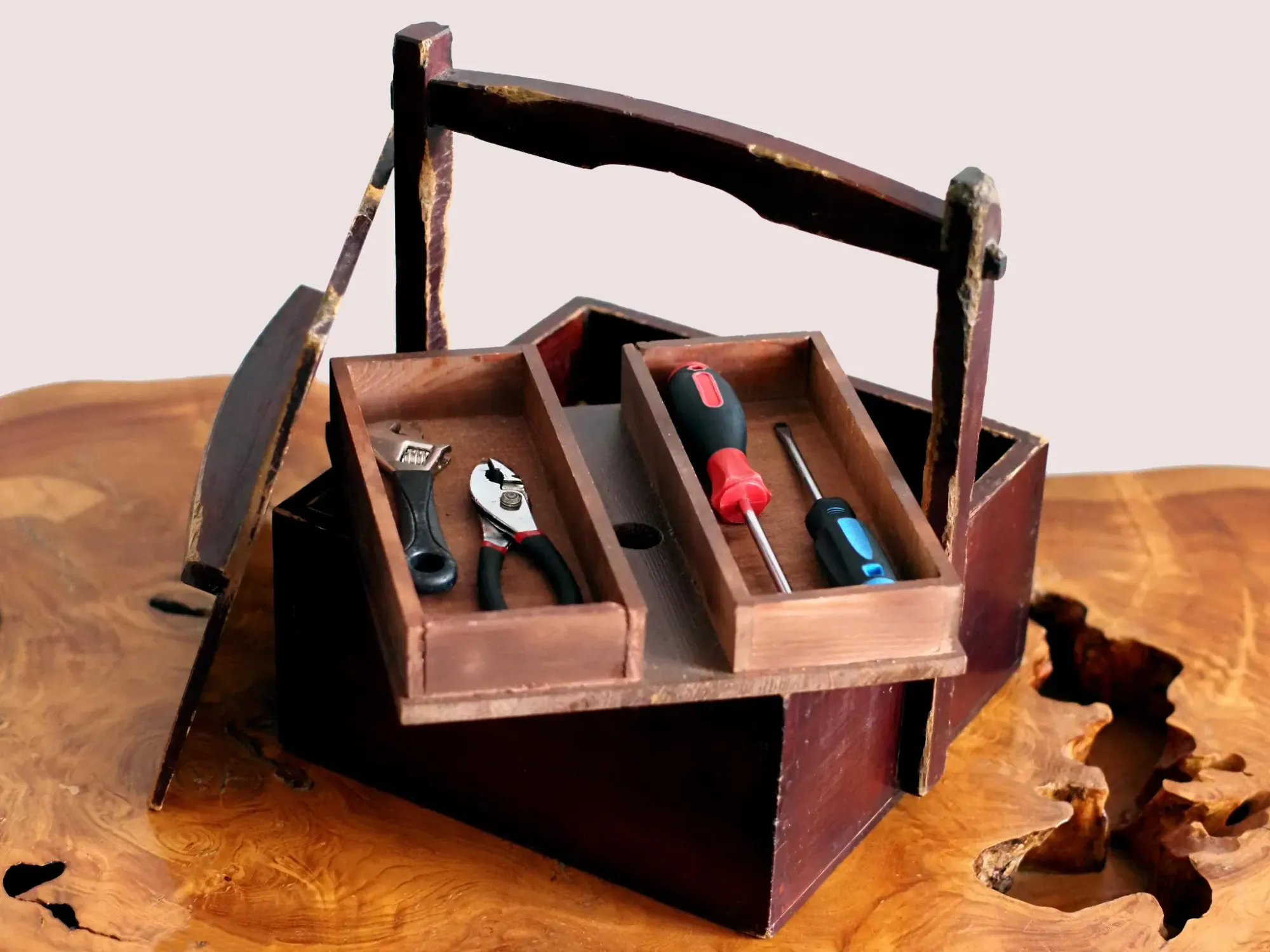 An okamochi repurposed into a toolbox. Credit: James Rogers